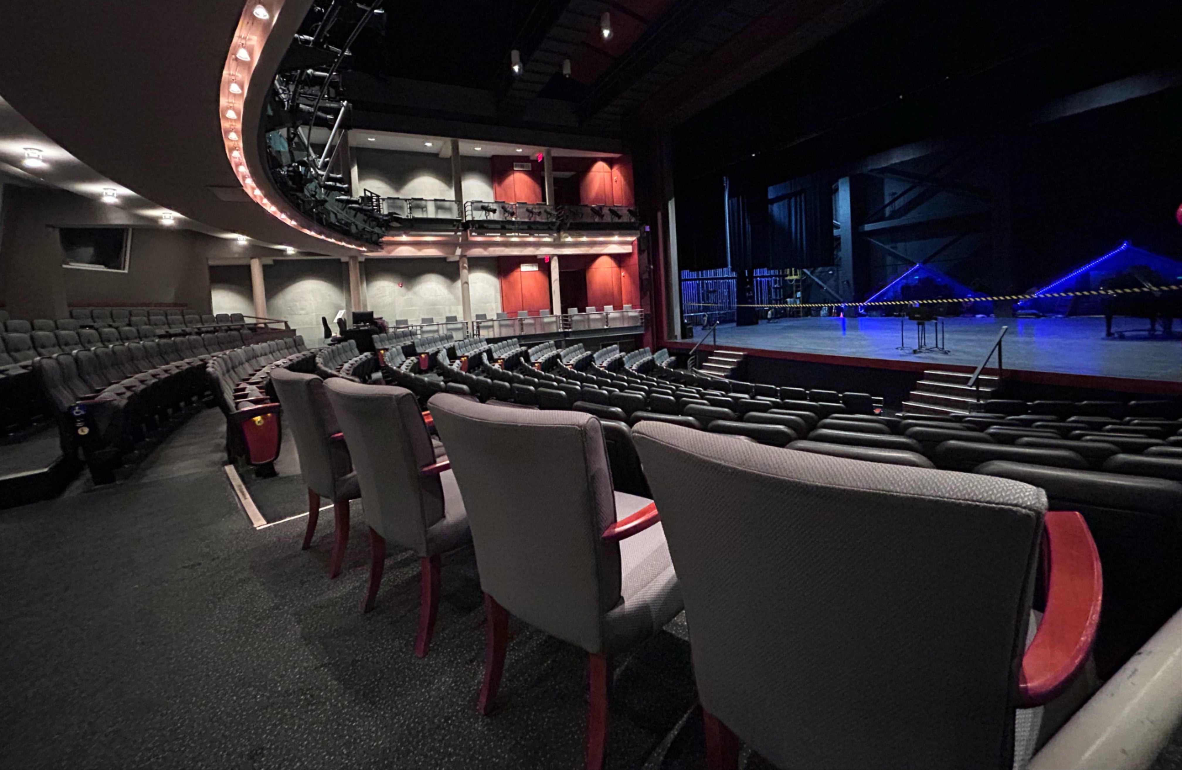 A photo of accessible seating in Fletcher Opera Theater these are arm chairs facing the stage