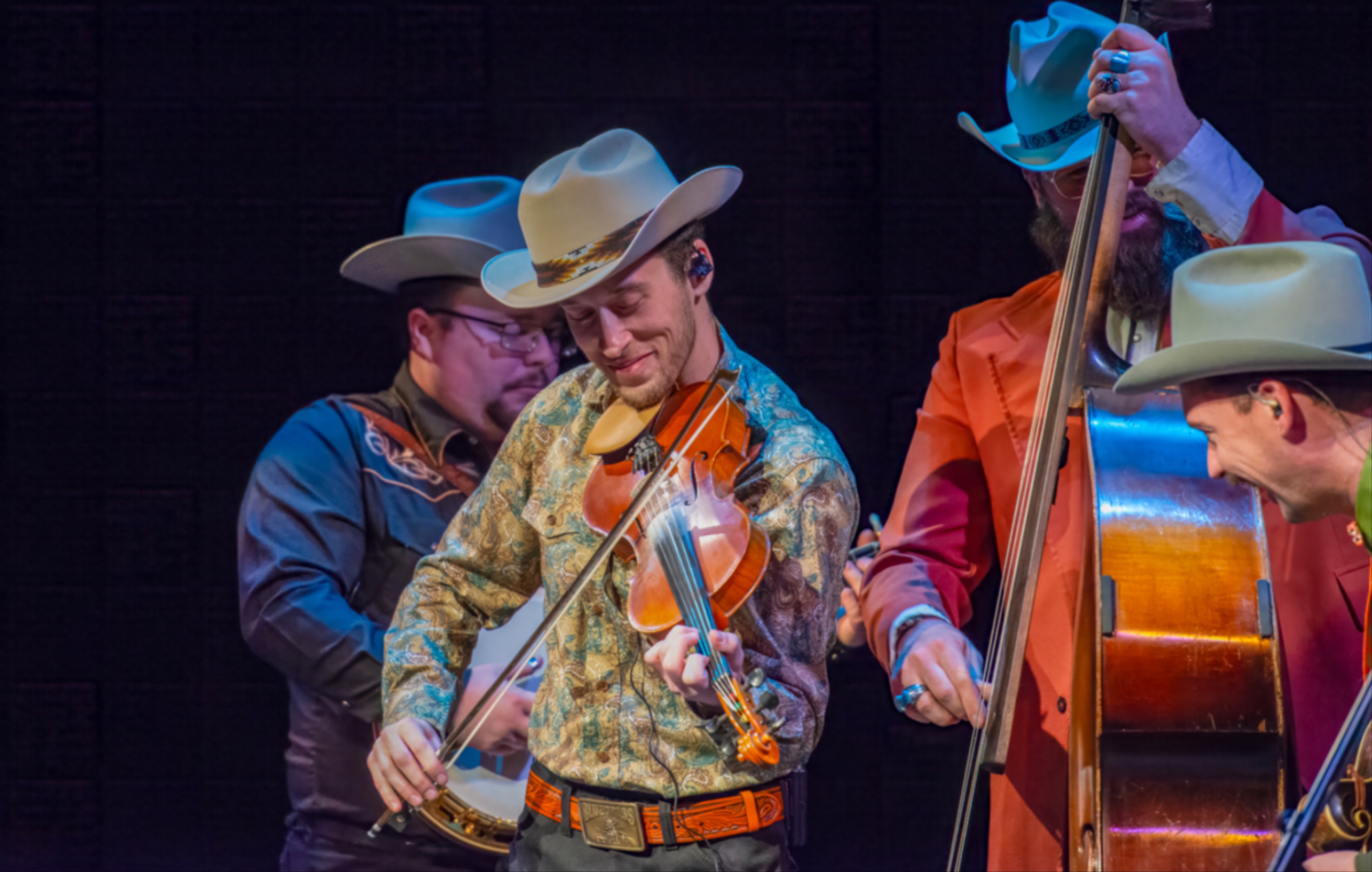 Po Ramblin Boys performing instruments on a stage