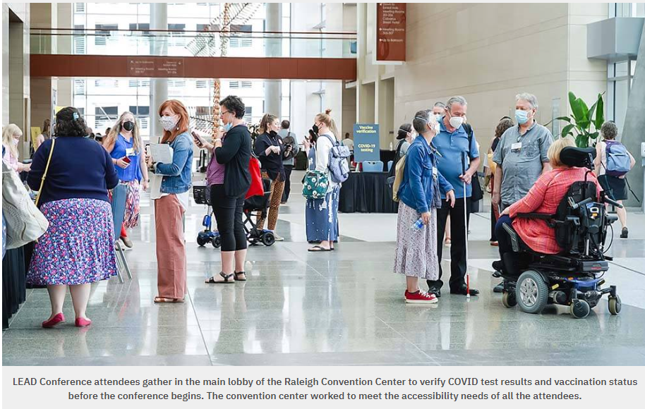 LEAD Conference attendees gather in the main lobby of the Raleigh Convention Center to verify COVID test results and vaccination status before the conference begins. The convention center worked to meet the accessibility needs of all the attendees.