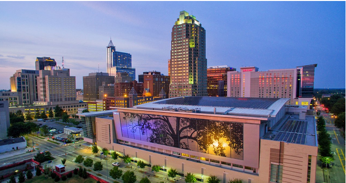 SKY PHOTO AT DUSK OF THE RALEIGH CONVENTION CENTER