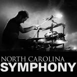 Black and white photo of person playing the drums