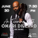 a photo of Omari Dillard wearing a white shirt, black vest and tie. He is carrying a violin over his shoulder.
