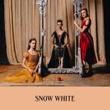 Photo of three female dancers around a mirror frame with text that says "Snow White"