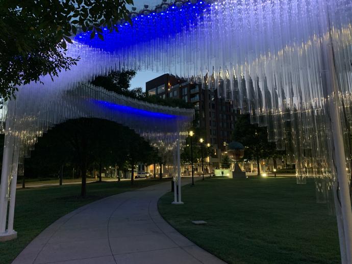 Standing behing the new Sonarc art installation, you can see the famed Raleig acorn in front of the Meymandi Concert Hall