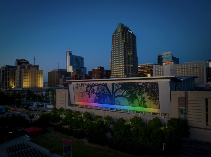 Raleigh Convention center shimmer wall with Raleigh skyline in the background