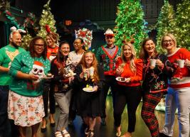 an image of a group of people dressed in holiday attire