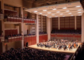 A photo of Meymandi Concert Hall stage and audience