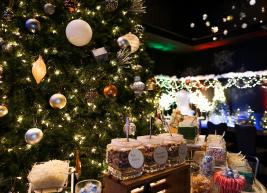 a photo of a room decorated with holiday decor