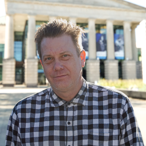 jason morris headshot with checkered shirt