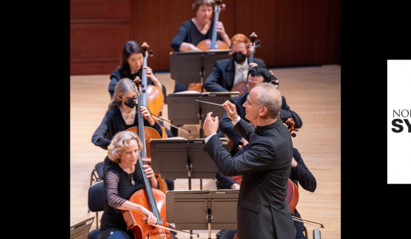 a photo of the nc symphony musicians with the conductor the nc symphony logo is also shown to right